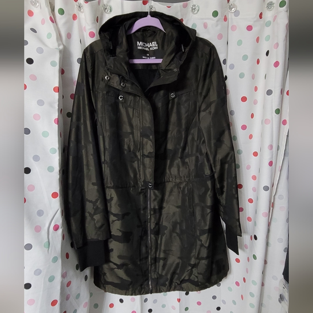 NWOT Michael Kors jacket. Black/green camo print with silver accents. NEVER WORN